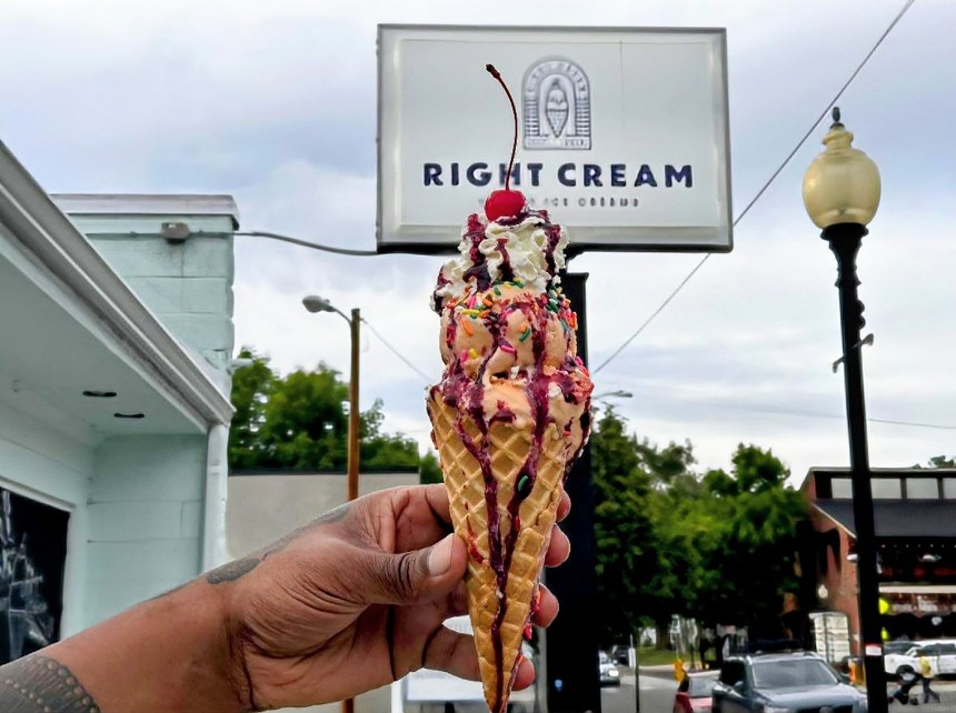 hand holding an ice cream cone