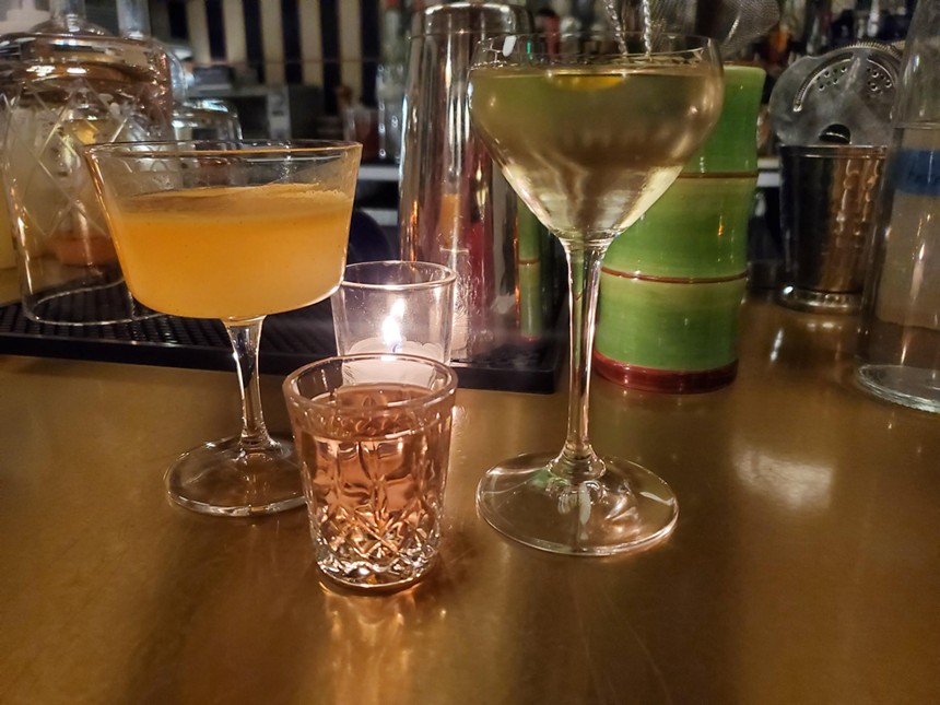 two cocktails  on a bar