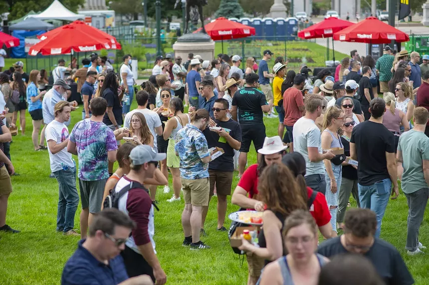 a crowd of people in a field