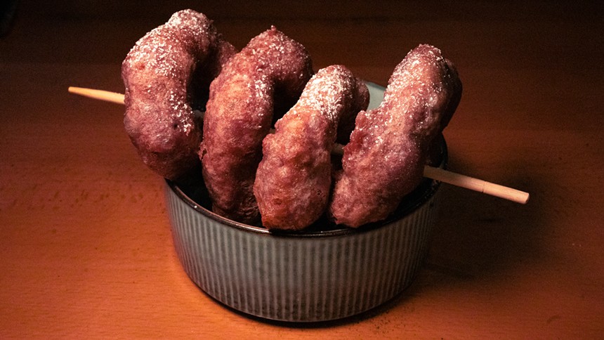 fried doughnuts on a stick