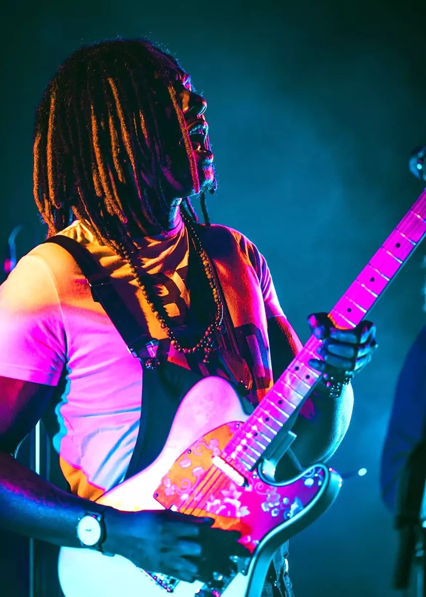 man playing guitar