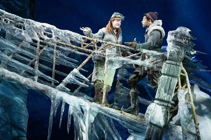 two people on an icy bridge