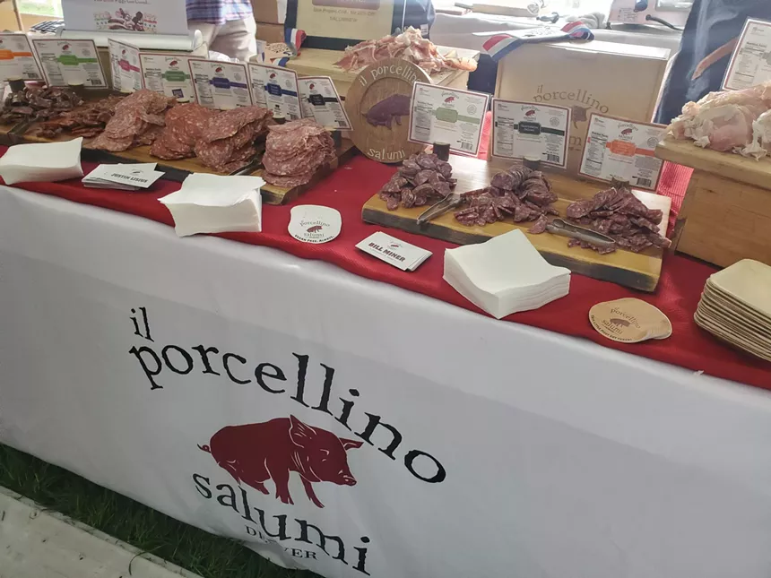 various cured meats on a table