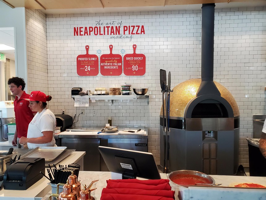a pizza oven inside a restaurant