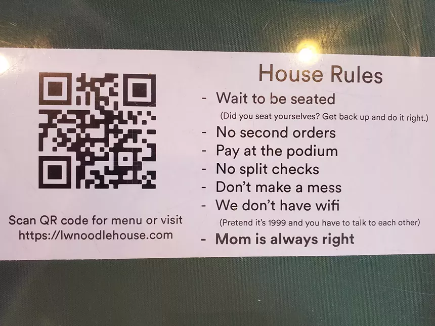 "house rules" typed on a piece of paper