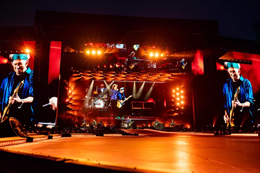 the rolling stones performing at empower field in denver