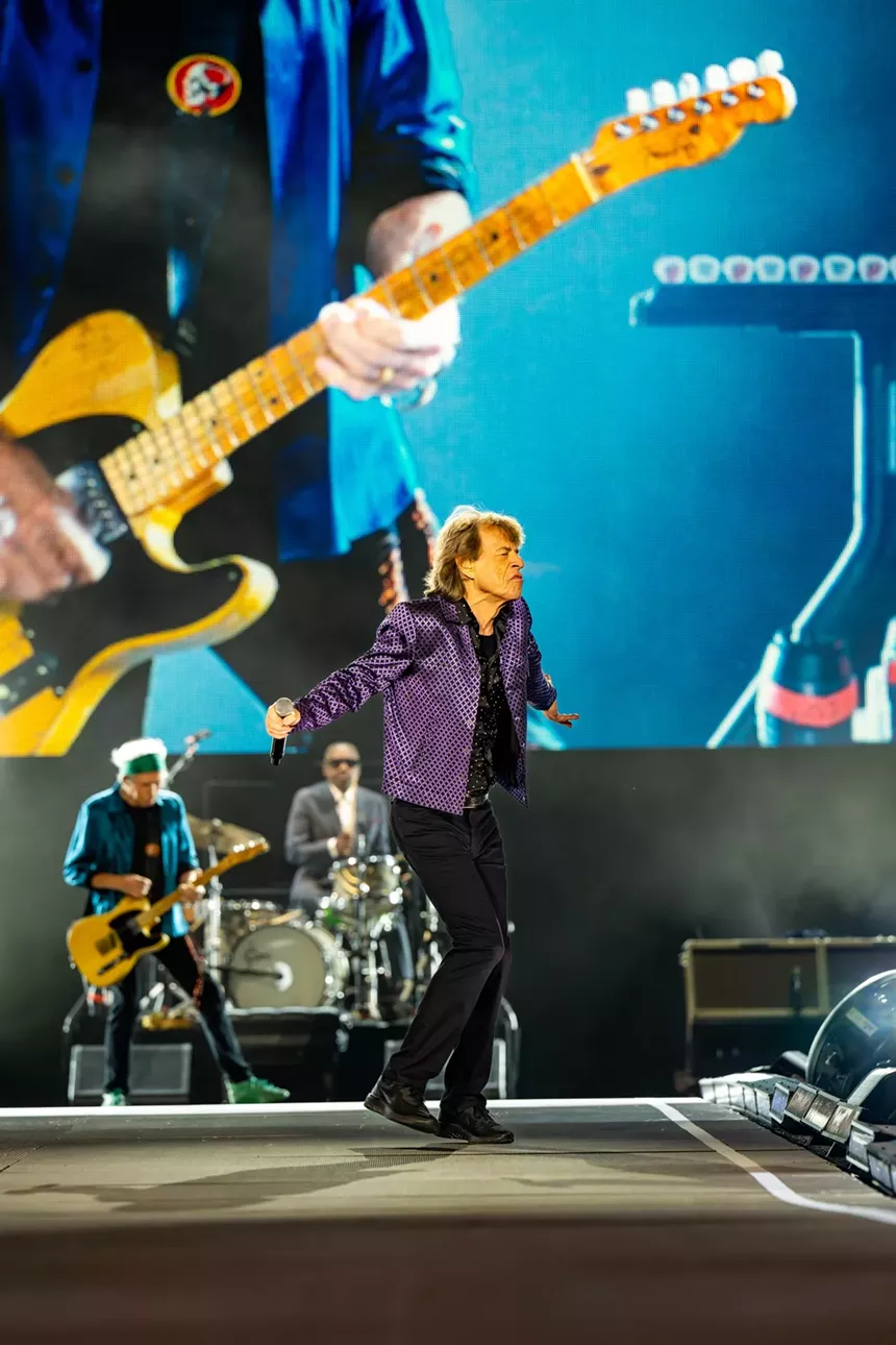 the rolling stones performing at empower field in denver