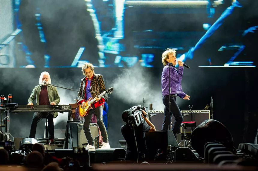 the rolling stones performing at empower field in denver