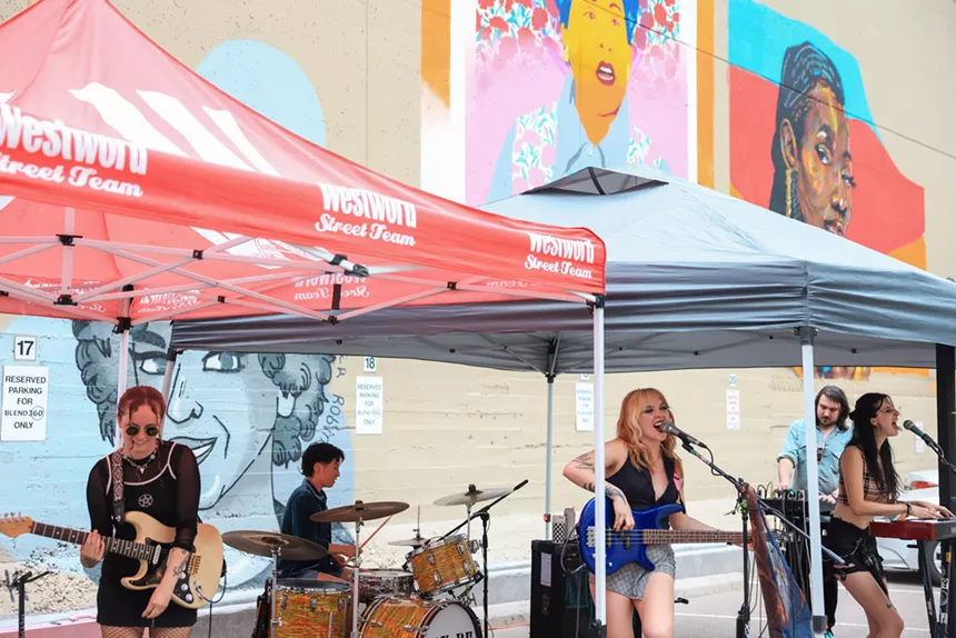 Denver band May Be Fern performs a concert in the parking lot of Westword
