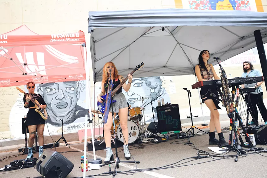 Denver band May Be Fern performs a concert in the parking lot of Westword
