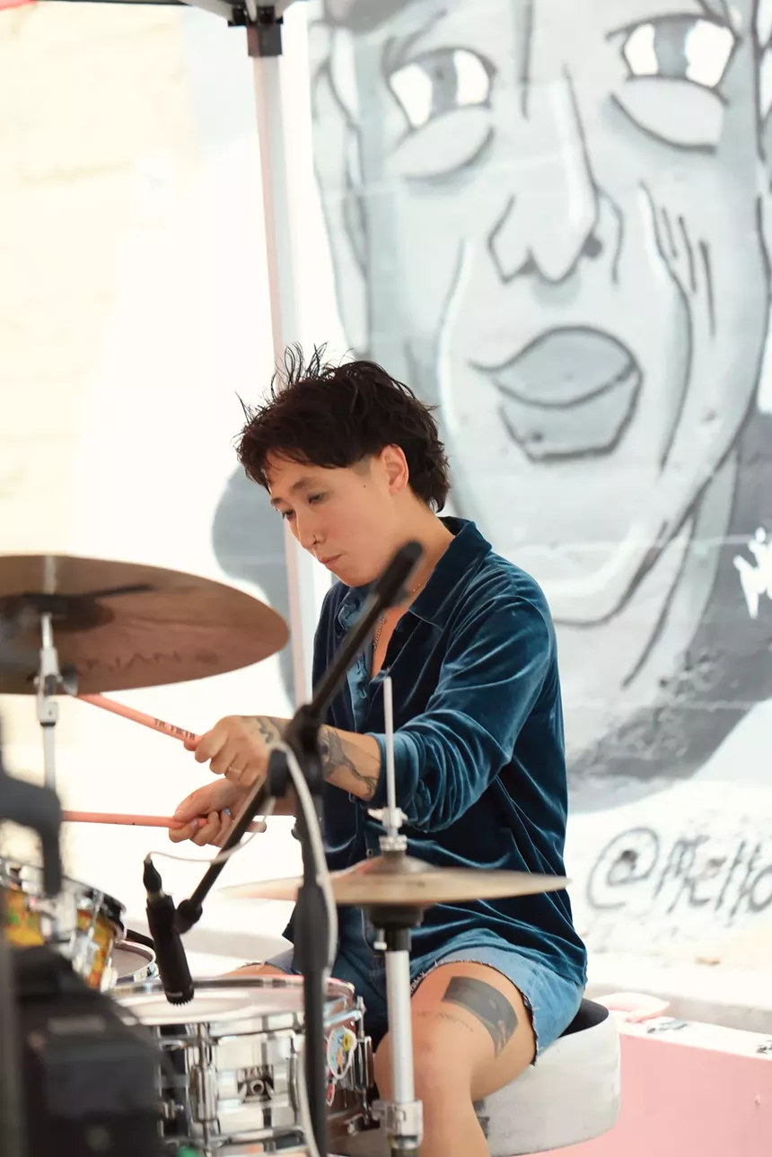 Denver band May Be Fern performs a concert in the parking lot of Westword