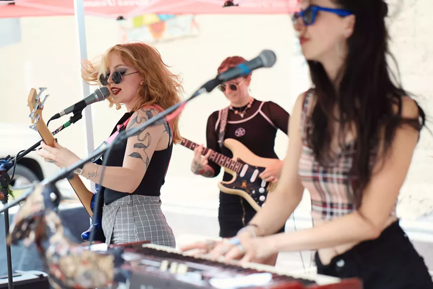 Denver band May Be Fern performs a concert in the parking lot of Westword