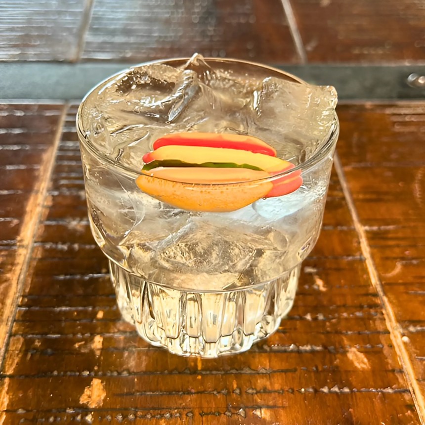 Cocktail with a hot dog.