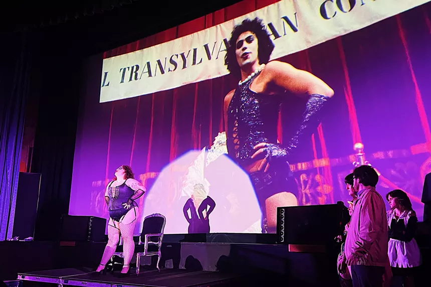 Shadow cast members perform The Rocky Horror Picture Show at the Esquire Theatre.