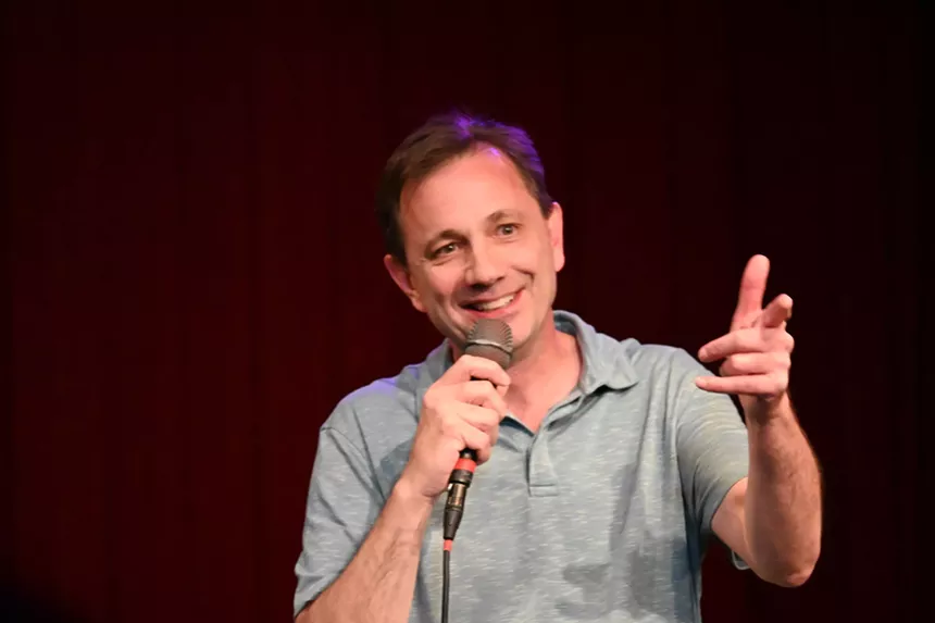 standup comedian performing