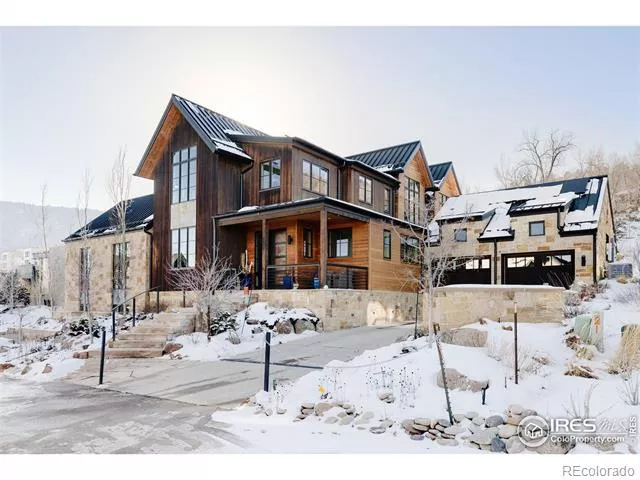 modern boulder home in snow