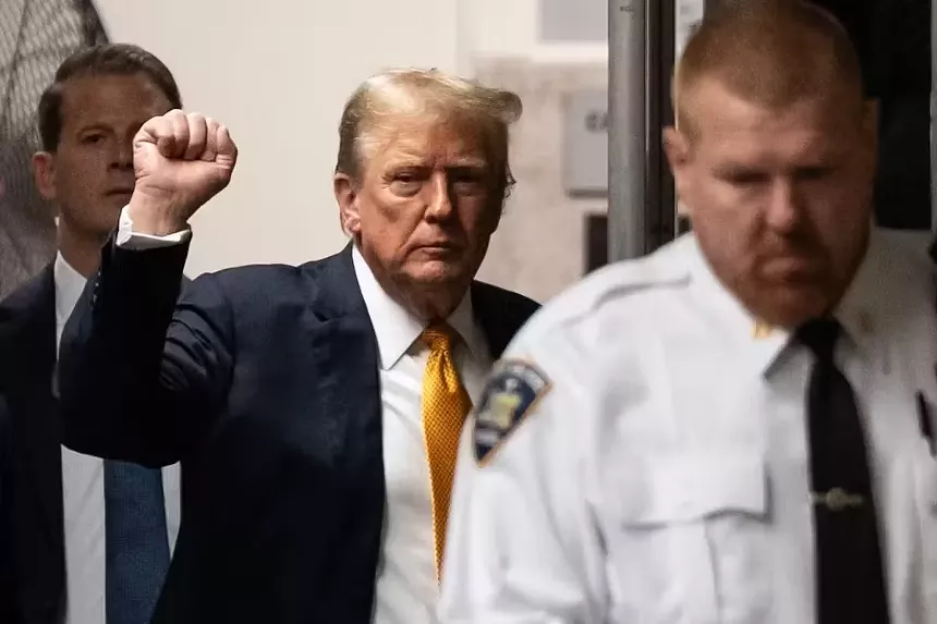 trump raising fist
