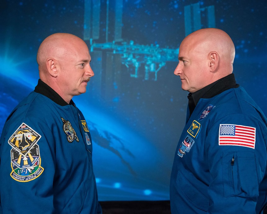 two astronauts facing each other