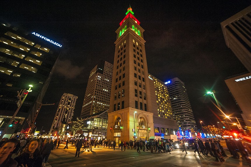downtown tower lit up for holiday