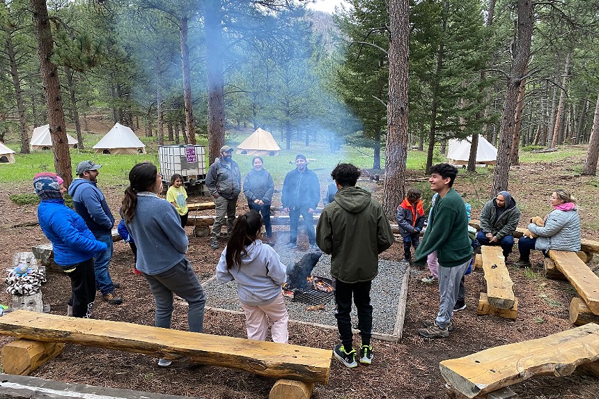 A Latino family camps with the Cal-Wood Education Center in the summer of 2023.