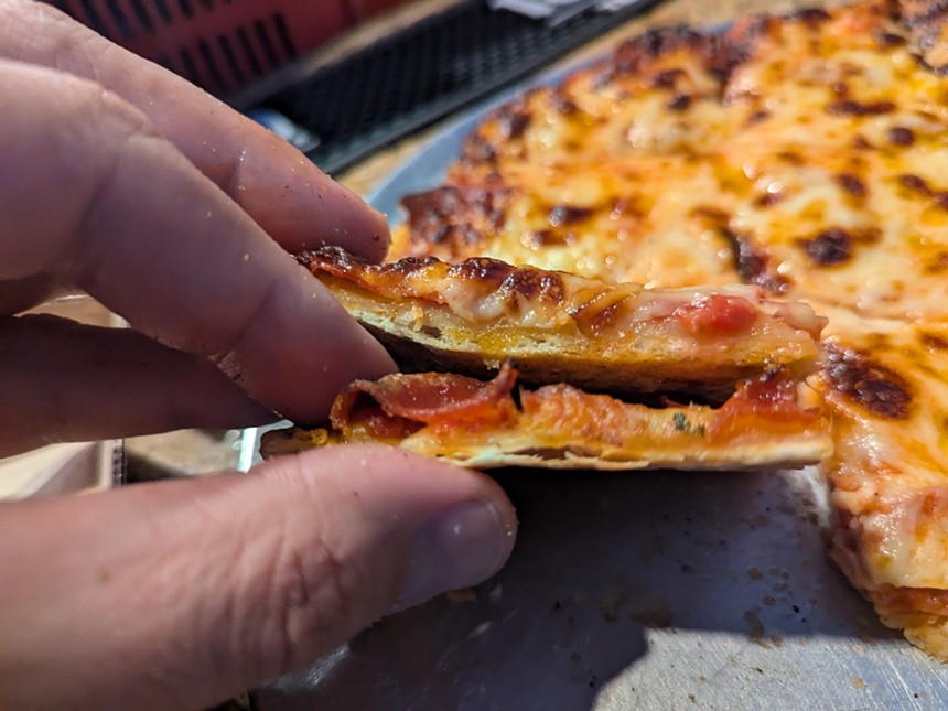 Two slices of pizza.