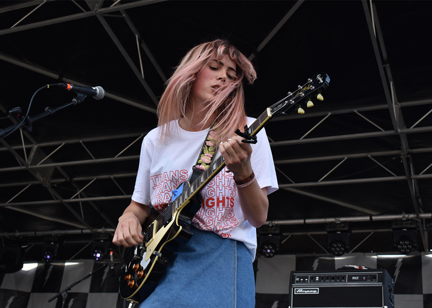 woman playing guitar