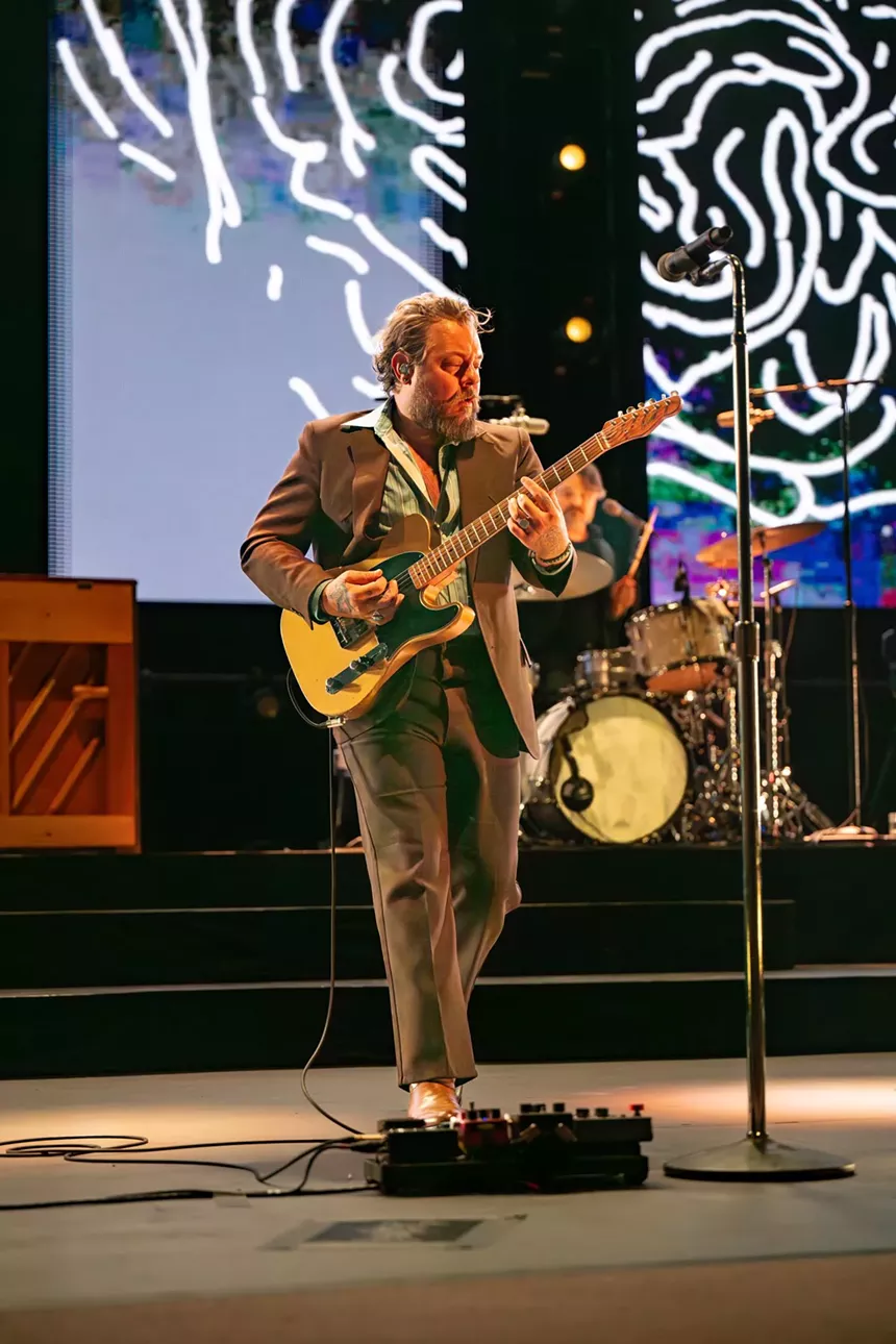 Nathaniel Rateliff playing guitar