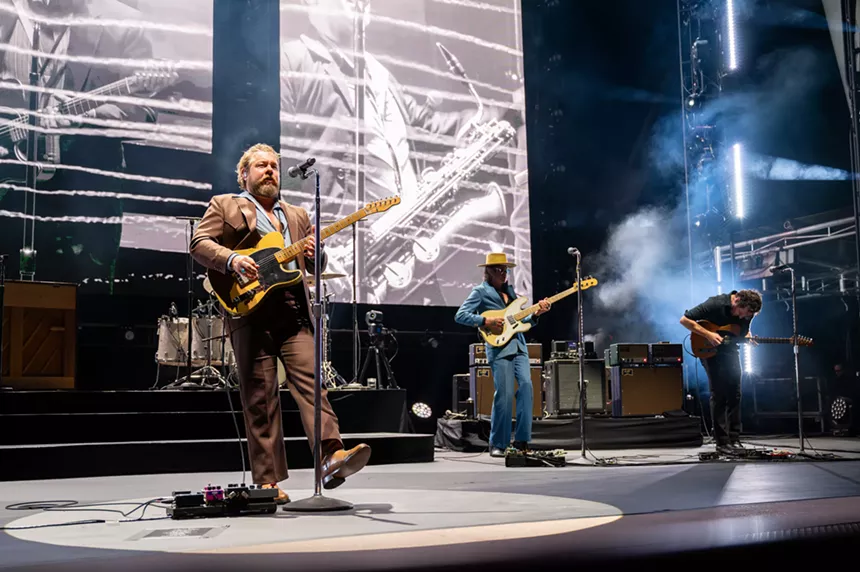 Nathaniel Rateliff playing guitar