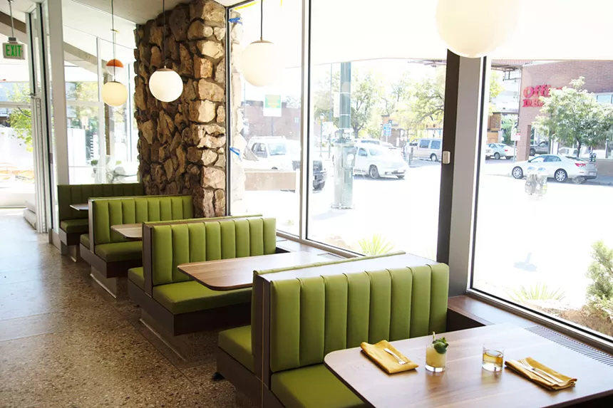 green booths in a restaurant