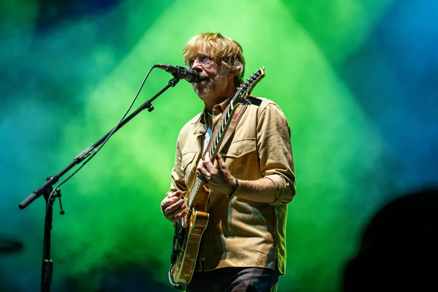 Trey Anastasio singing and playing guitar