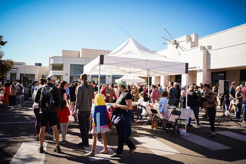 Crowds of Denver Bake Fest attendees in the parking lot outside of Rebel Bread