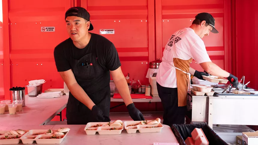 chef in a black apron