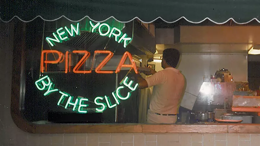 neon sign in a window