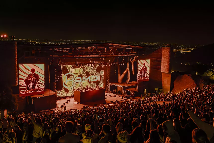A photo showing the crowd at Red Rocks while Hamdi is performing.