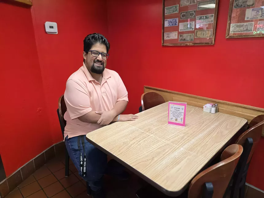man sitting at a table