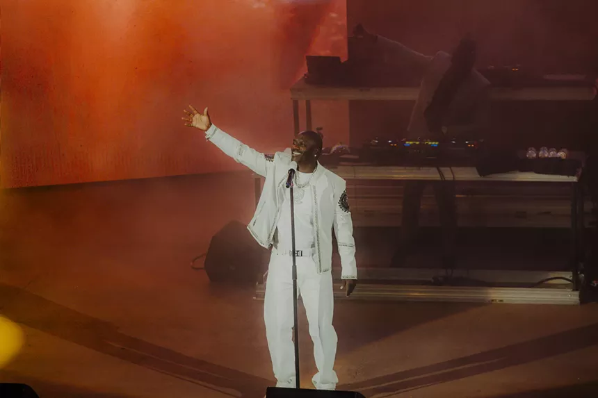 A photo of Akon on stage.