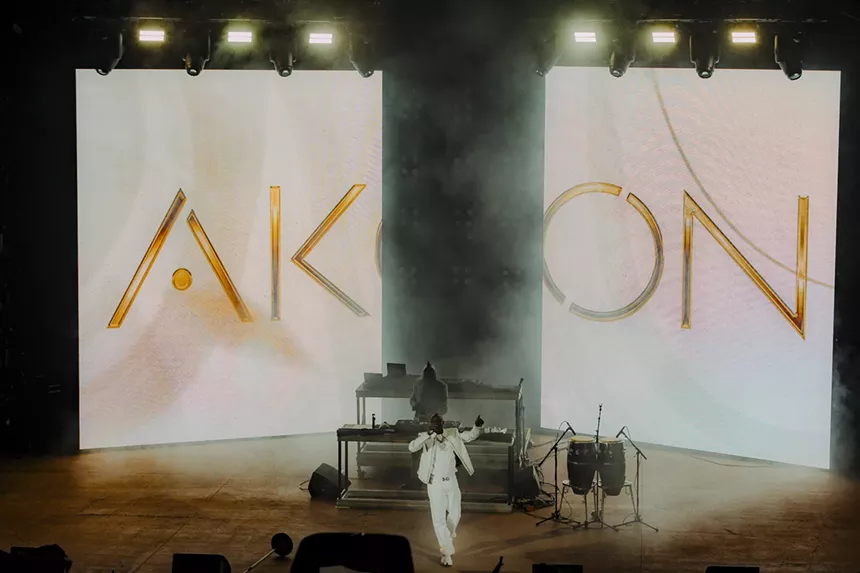 A photo of Akon on stage performing at Red Rocks in Morrison, Colorado.