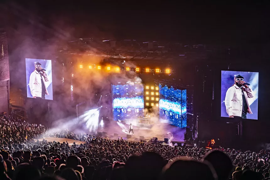 A photo showing the Red Rocks crowd during T-Pain's healdining performance.