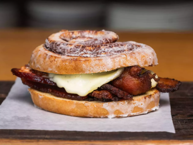 breakfast sandwich on a cinnamon roll bun