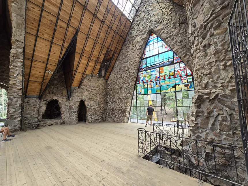 stained glass wall inside castle