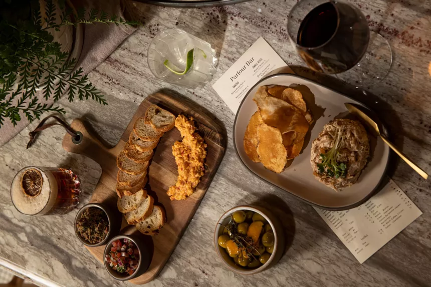 two plates of snack and cocktails