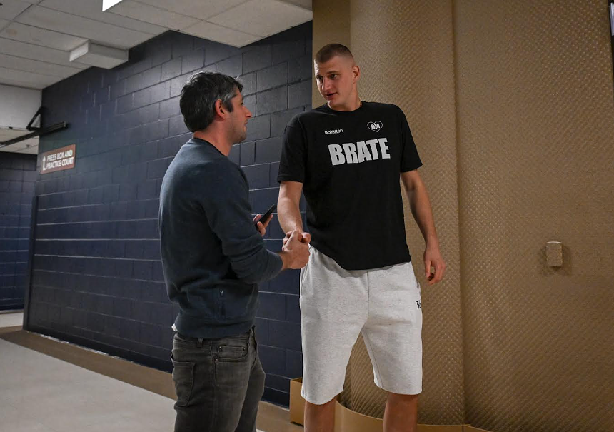 reporter interviews Nikola Jokic