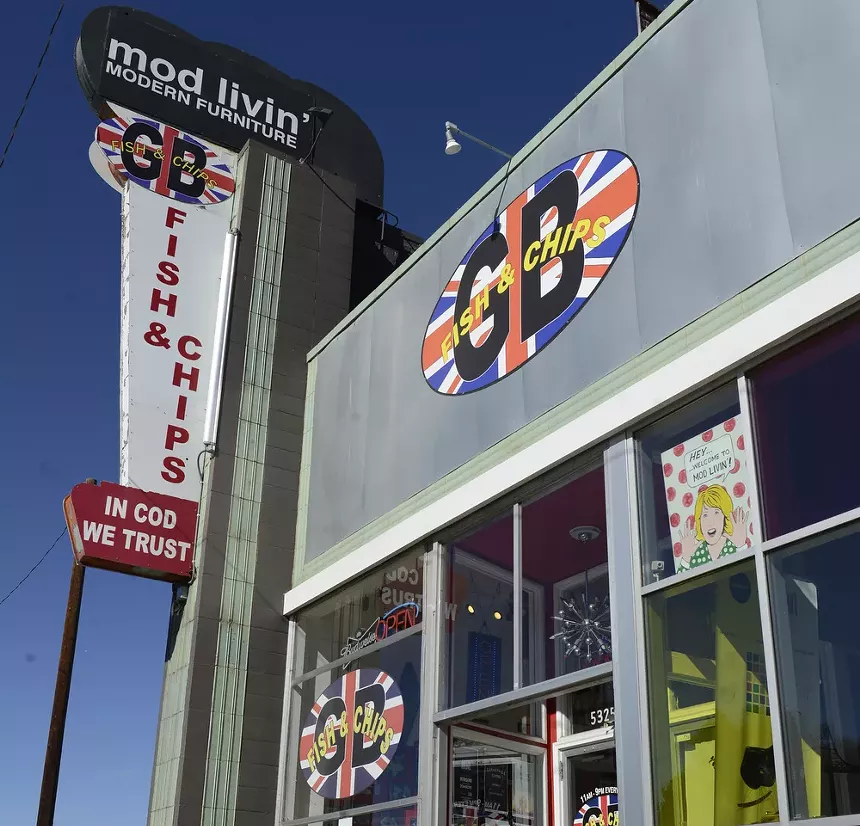 fish and chips sign on a building