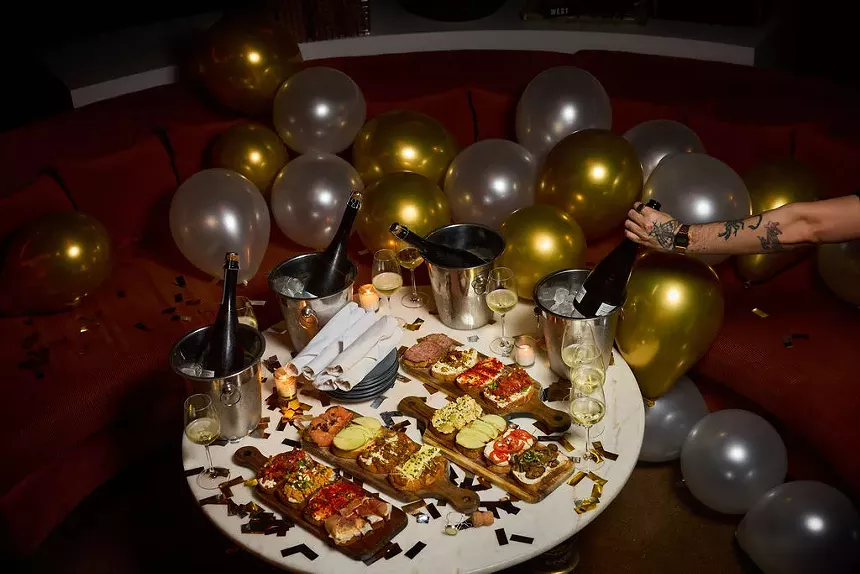 bruschetta boards and bottles of champagne on ice