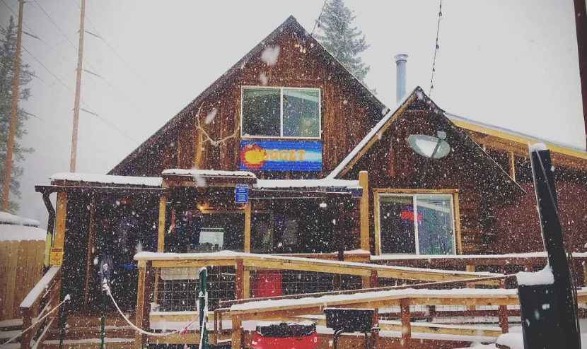 wooden building on a snowy day