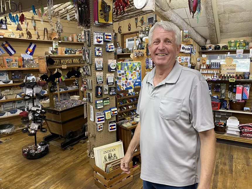man in souvenir store