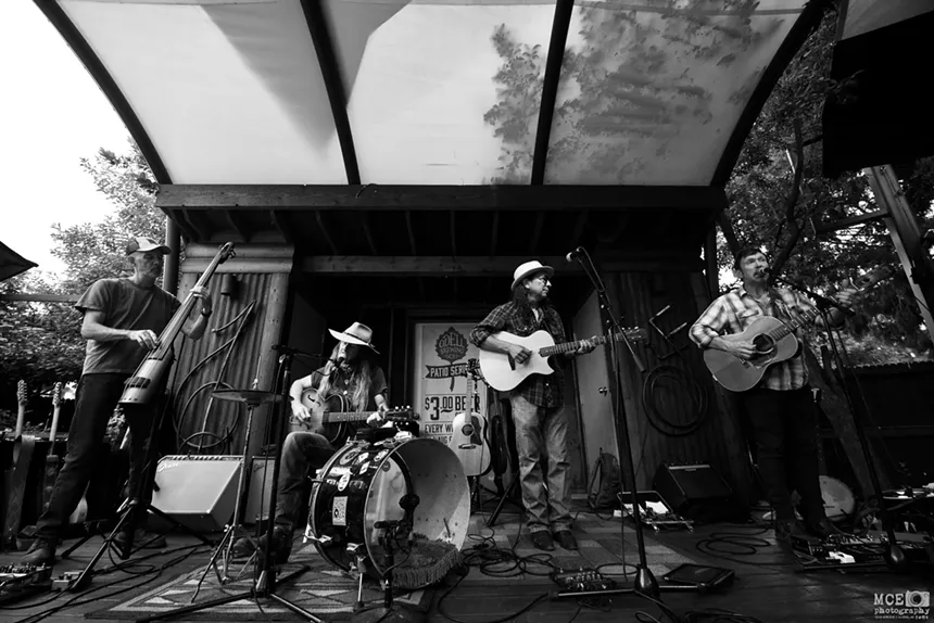 band performing on a patio