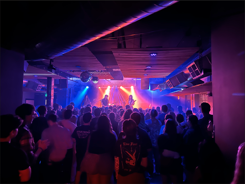 band performing in a venue