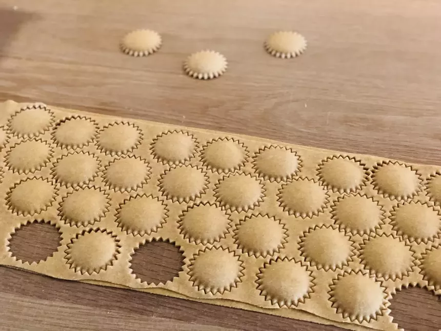 ravioli stamped from a full sheet of dough