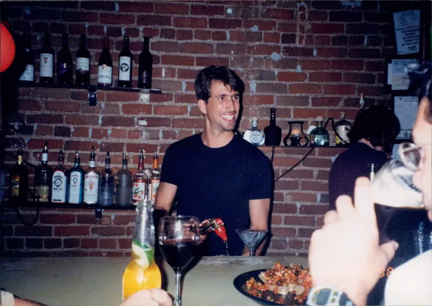 man behind a bar